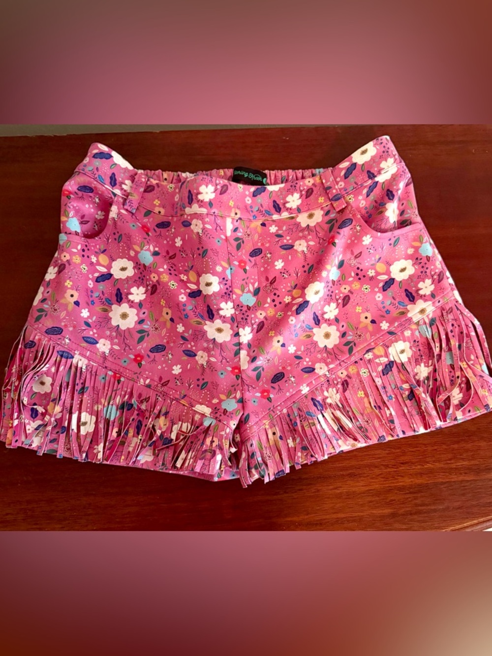 Pink Floral Fringe Shorts by Sterling Kreek